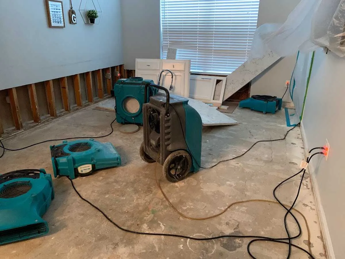 Dehumidifier in flood-cut room for Water Damage Restoration in Fussels Corner